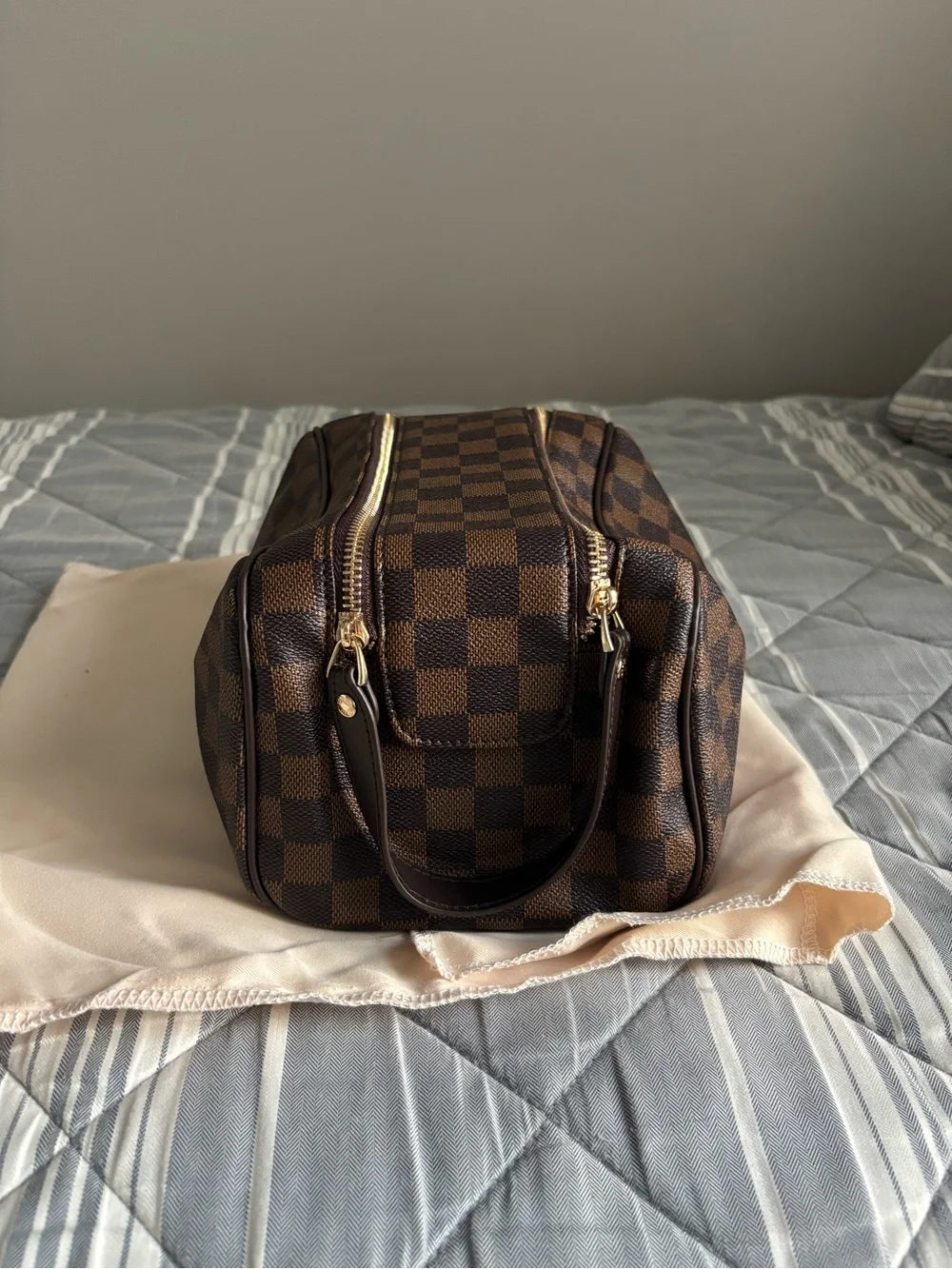 barely used LV cosmetic bag
